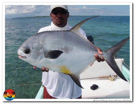 Guest with Bruce Leslie during a day of fishing in Placencia by Bruce Leslie